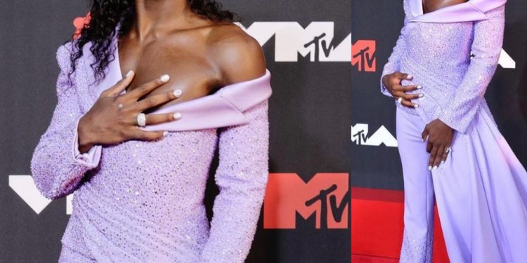 Lil NasX Arrived At The VMAs Wearing Lilac And A Soul Glo Curly Mullet