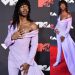 Lil NasX Arrived At The VMAs Wearing Lilac And A Soul Glo Curly Mullet