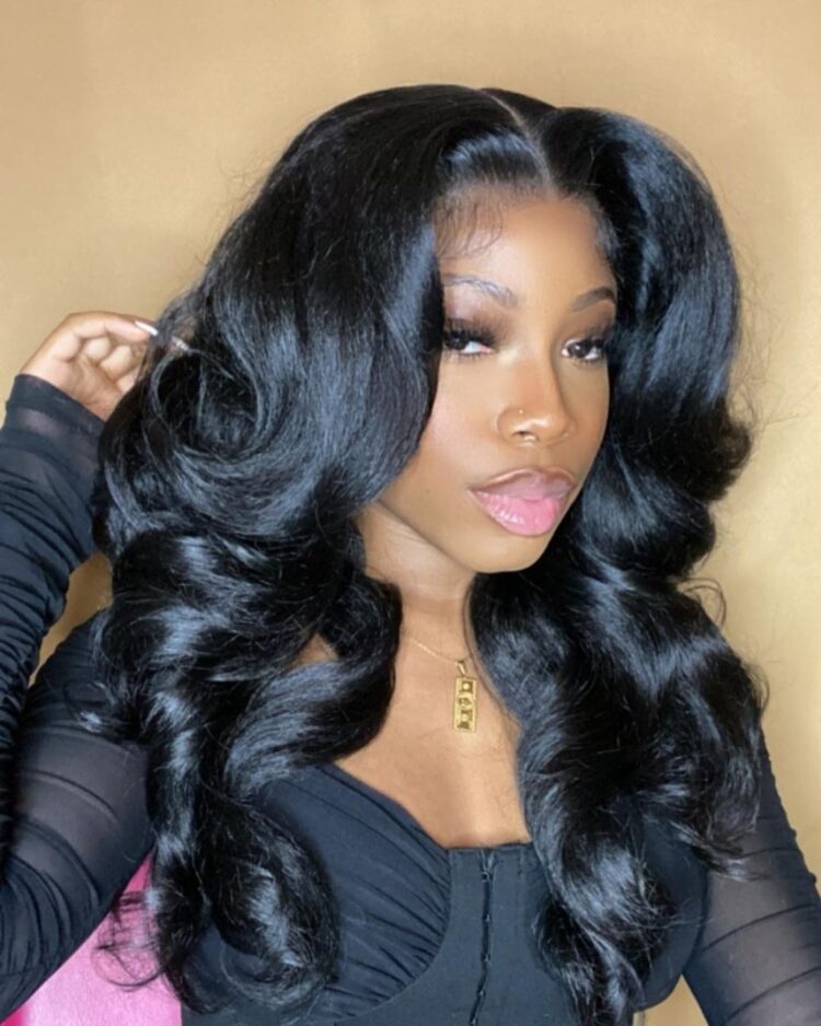 Black woman wearing premium synthetic wig that looks natural