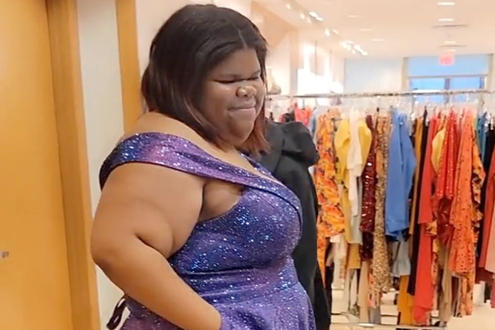 teen gifted prom dress by store owner