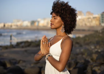 Black woman performing a spiritual moon ritual for healing