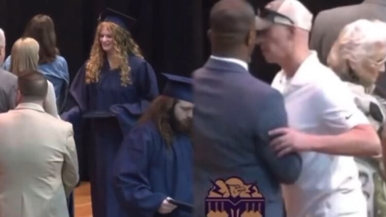 Chaos Erupts At High School When Dad Storms Graduation Stage To Stop Black Admin's From Shaking His Daughter's Hand